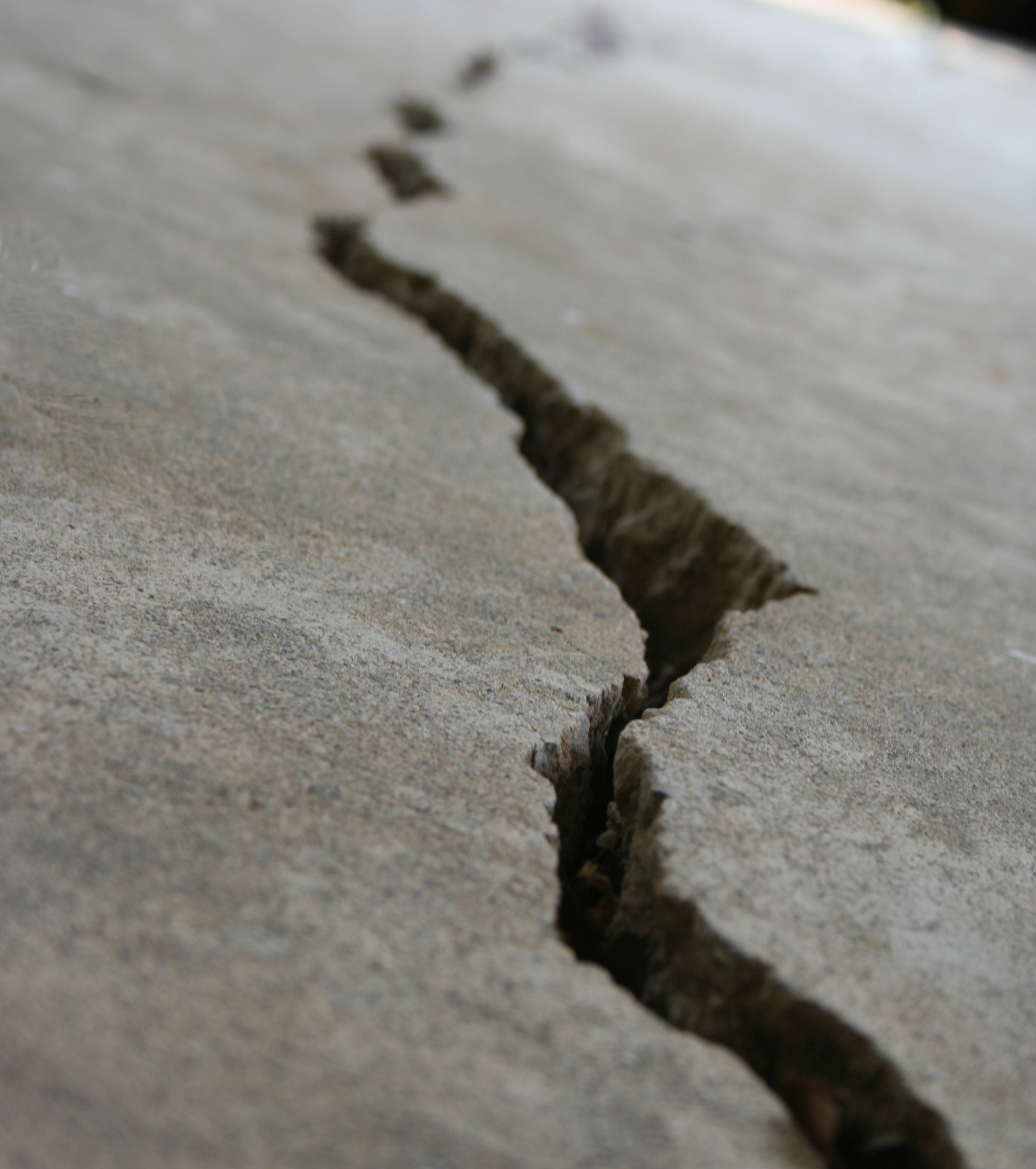 how to repair cracks in concrete